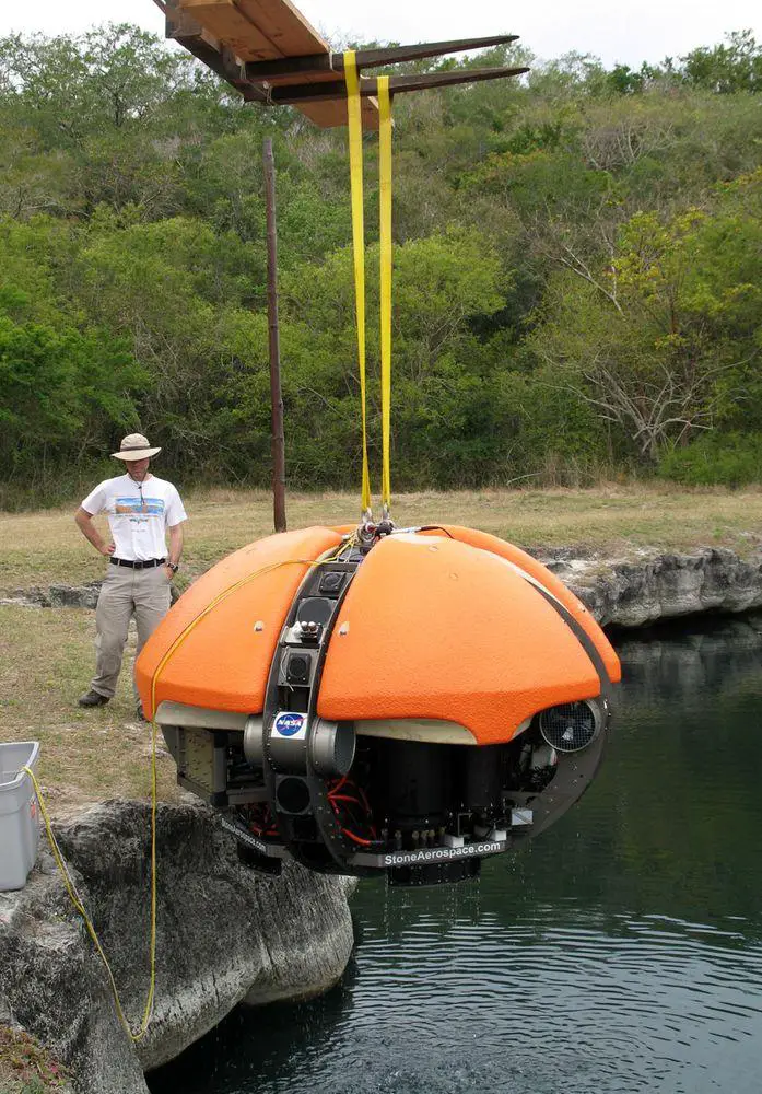 Rising DEPTHX robot out of La Pilita, Mexico. Travertine walls seen