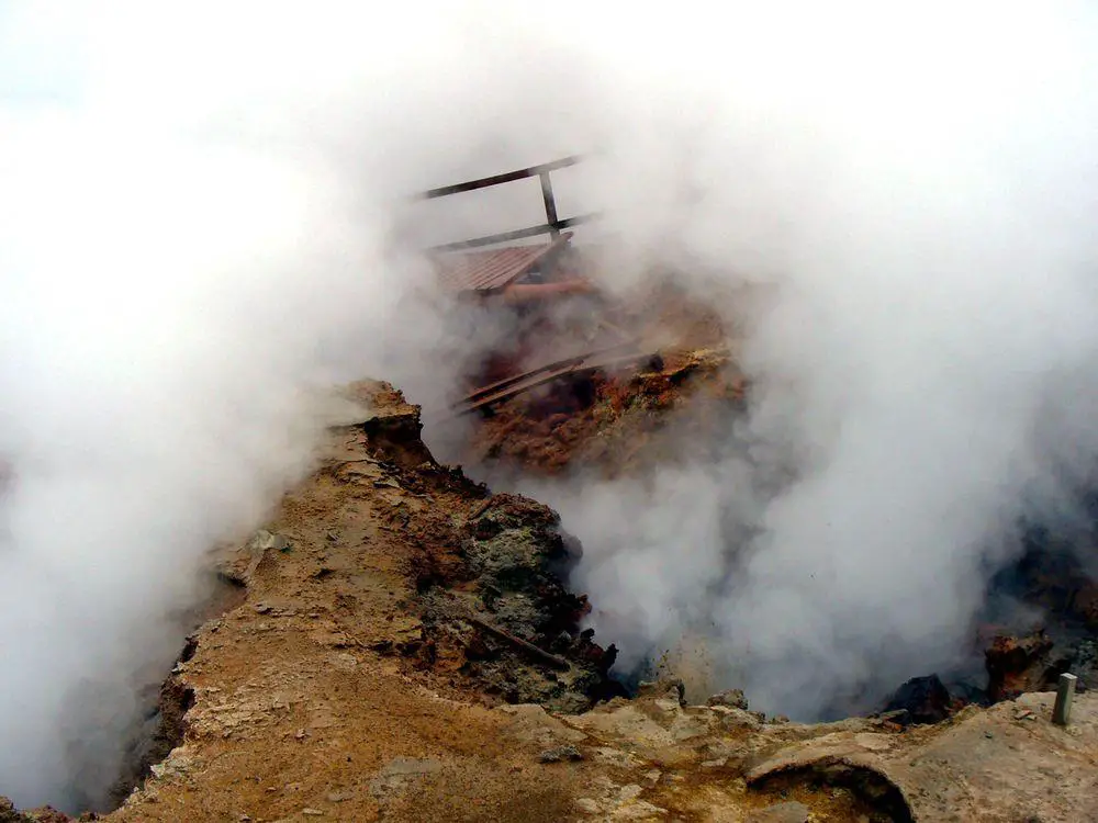 Gunnuhver geothermal area, collapsed visitors platform seen through the fume of fumarole