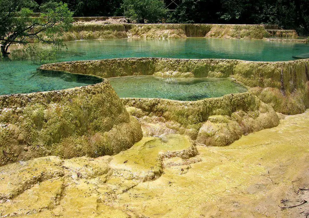 Travertine pools in Huanglong Valley, China