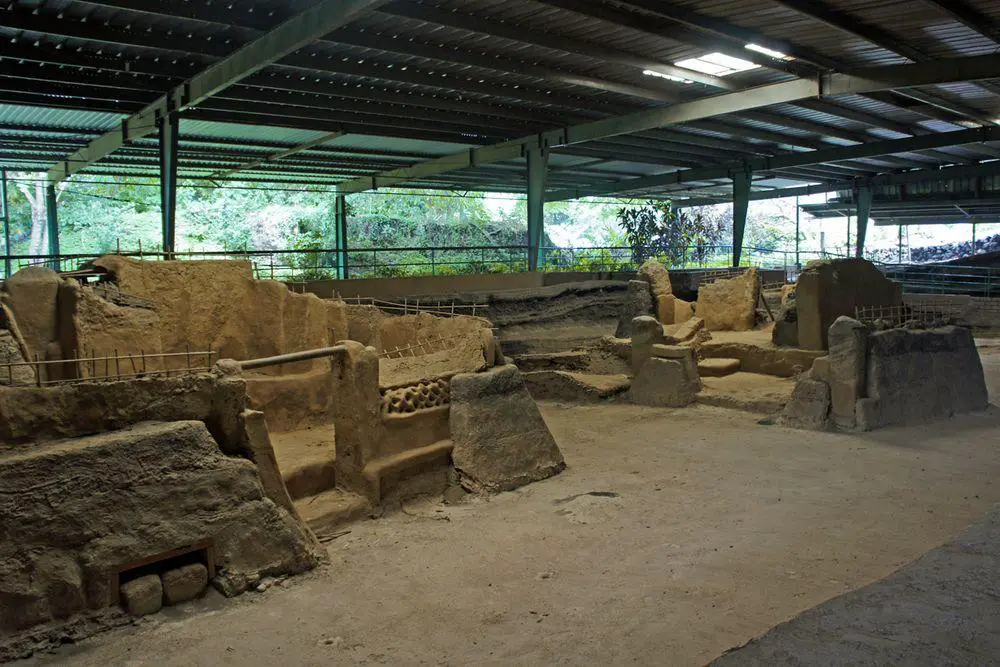 Joya de Cerén. Structure 12 in the forefront, with lattice detail - possible workplace of female shaman. Traces of mural reainin on its walls