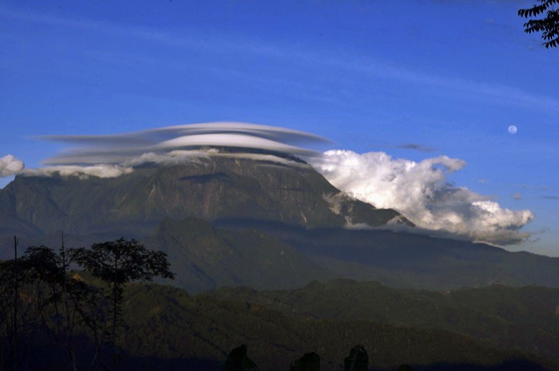Mount Kinabalu with characteristic cloud veil, Malaysia