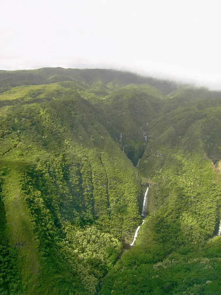 Moa'ula Falls from the air. Far right side shows a glimpe of Hipuapua Falls