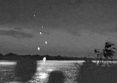 Naga lights rise above Mekong