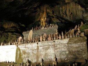 One of Pak Ou caves with statues of Buddhas, Laos