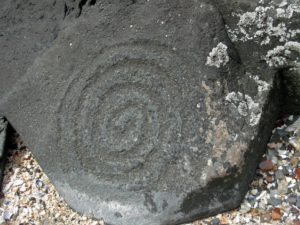 Petroglyph Beach in Alaska, stone with a carving of spiral