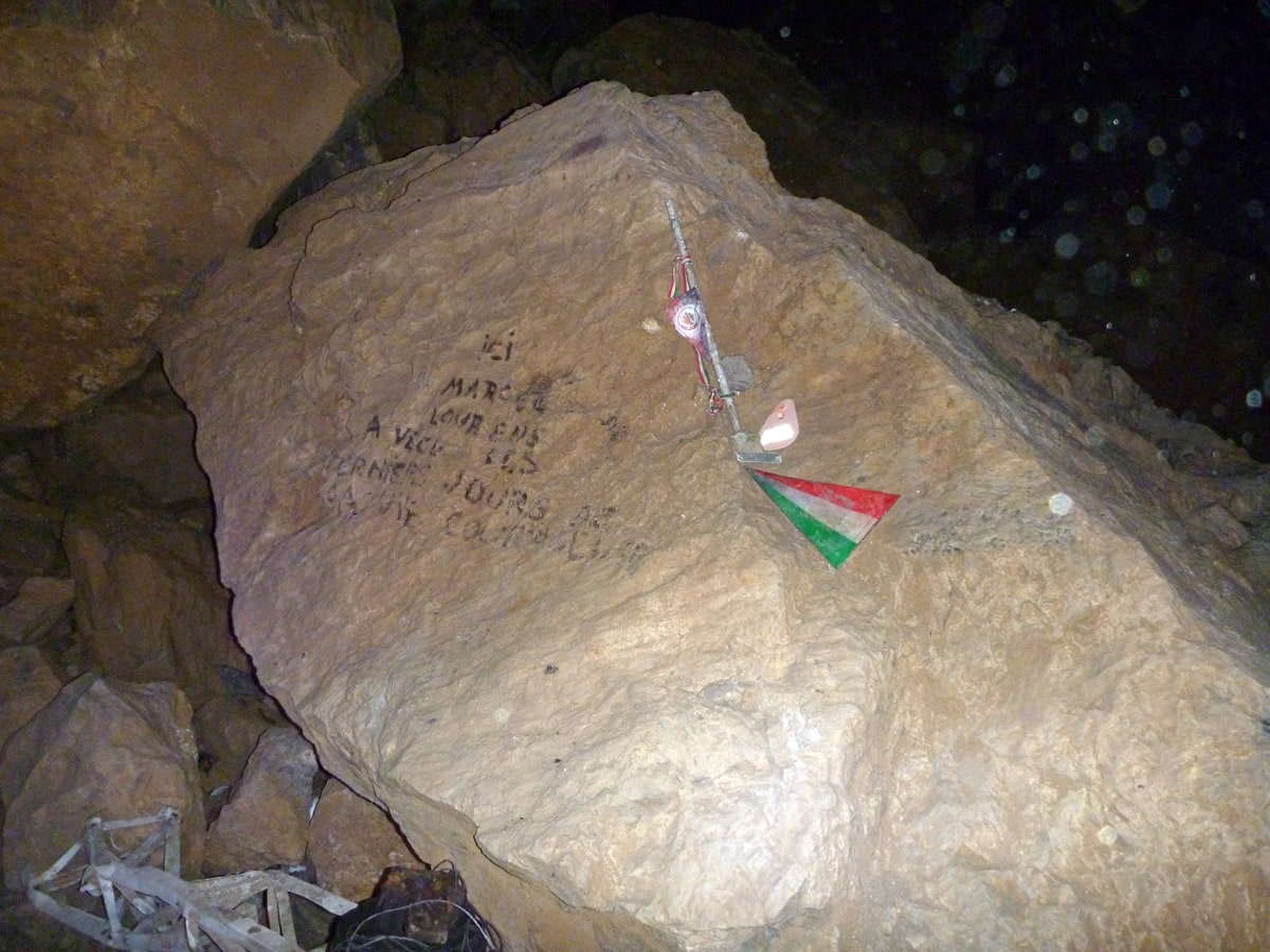 Pierre Saint-Martin Cave. On the stone is written: Here Marcel Loubens lived the last days of his courageous life