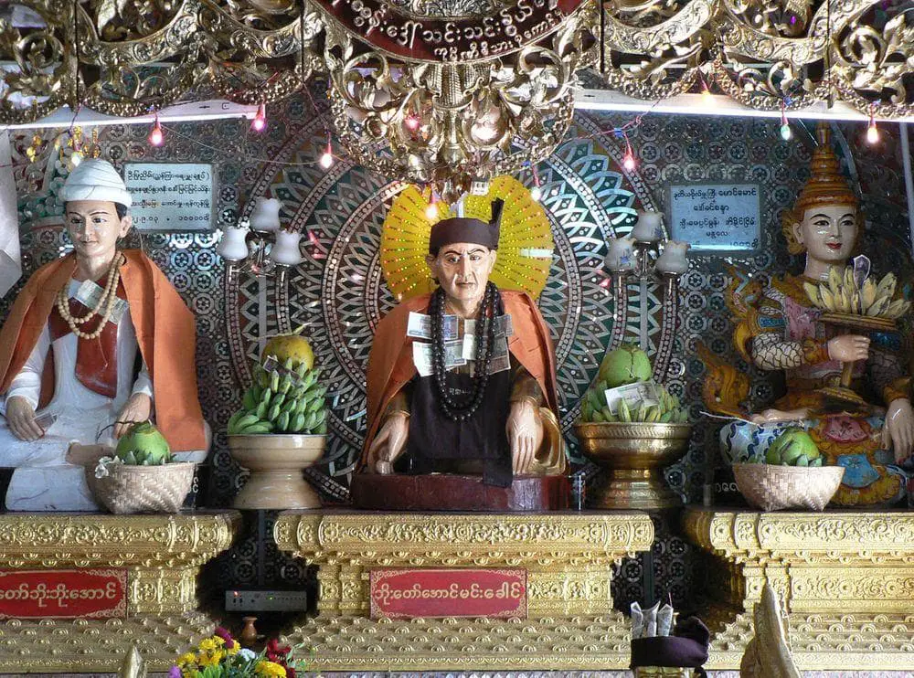 Sculptures of nats with offerings, Popa Taungkalat