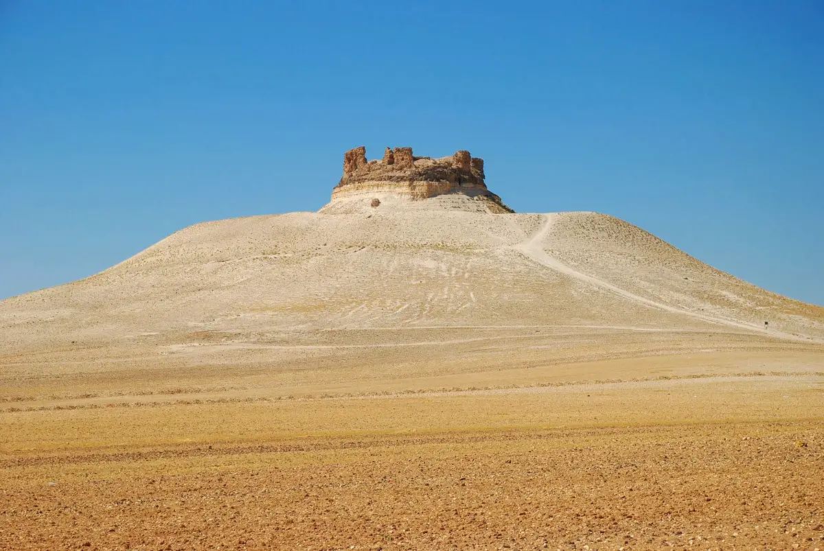 Shmemis Castle ruins on the top of extinct volcano, Syria