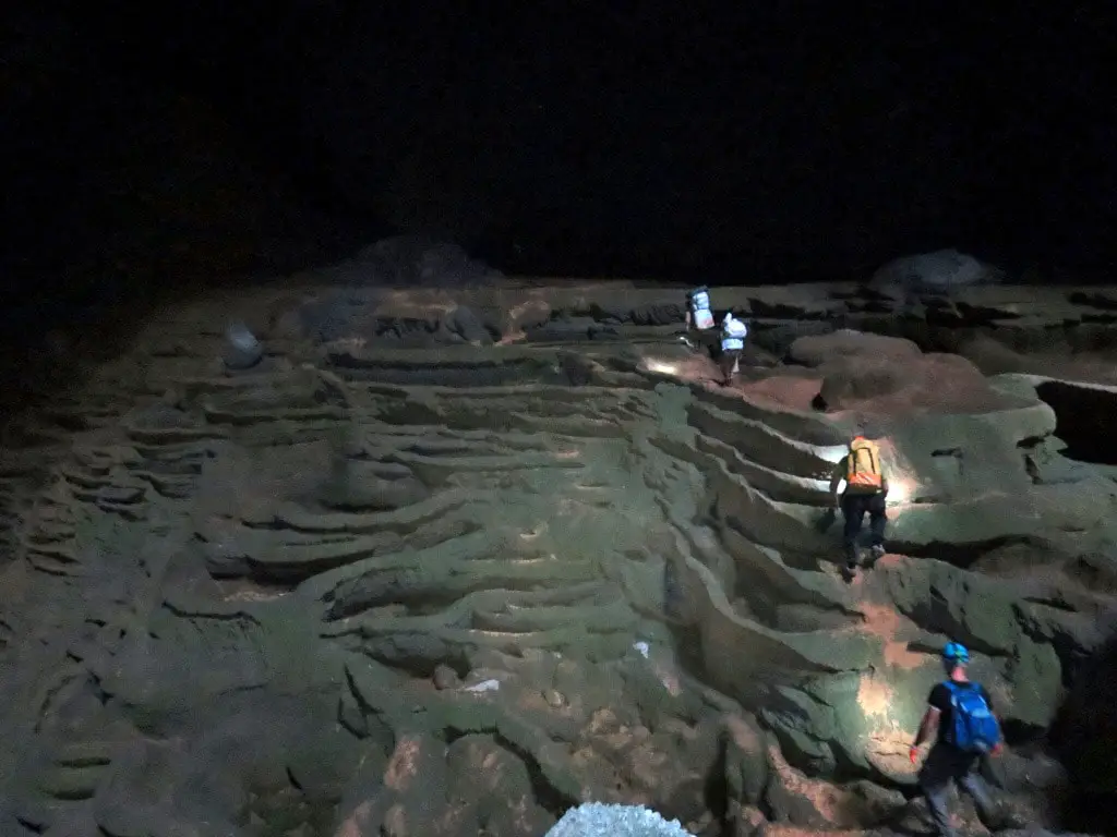 Walking over the giant gours in Son Doong cave, Vietnam