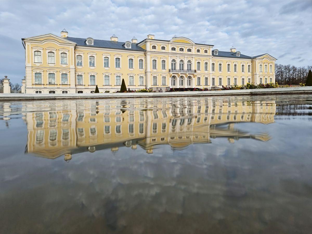 Rundale Palace mirroring in the pond of a fountain