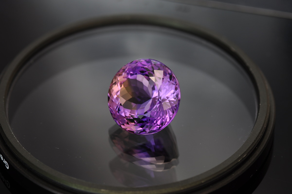 Ametrine crystal - jewel with a round cut